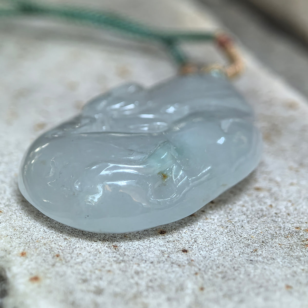 Glutinous White Jadeite Lotus and Fish Pendant with a Blue Undertone