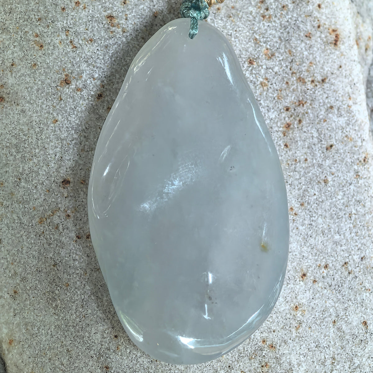 Glutinous White Jadeite Lotus and Fish Pendant with a Blue Undertone
