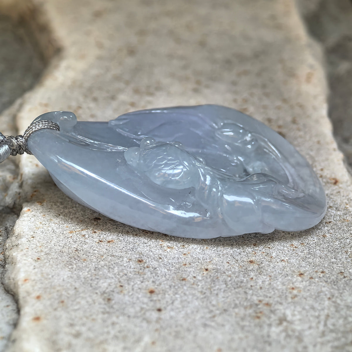 Fine Glutinous Blue-Lavender Jadeite Lotus and Fish Pendant