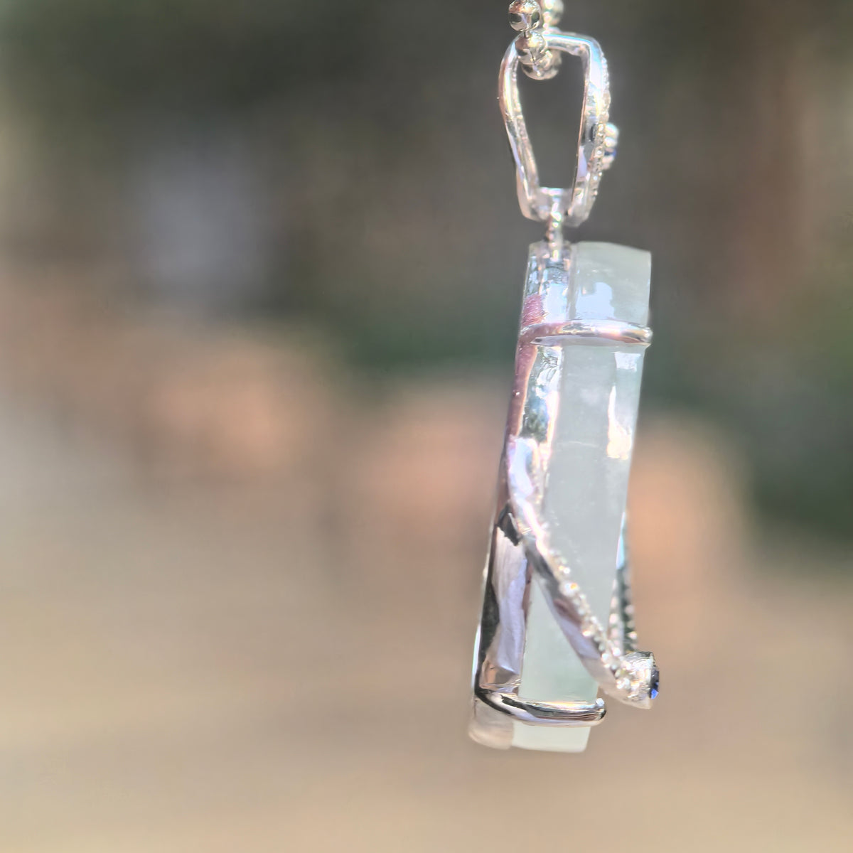 Icy Pale Green Jadeite Planet Pendant with Snowflake-Like Inclusions