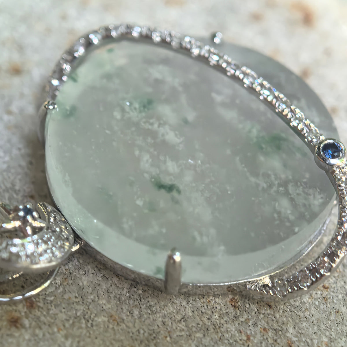 Icy Pale Green Jadeite Planet Pendant with Snowflake-Like Inclusions