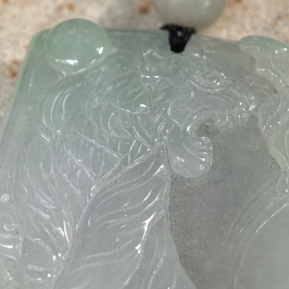 Glutinous Pale Green Ascending Tiger Jadeite Plaque Pendant