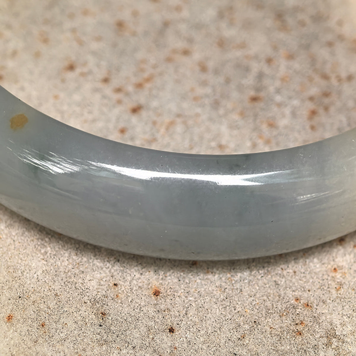 Fine Glutinous Pale White and Green D-Shape Jadeite Bangle with Golden Flecks -59mm