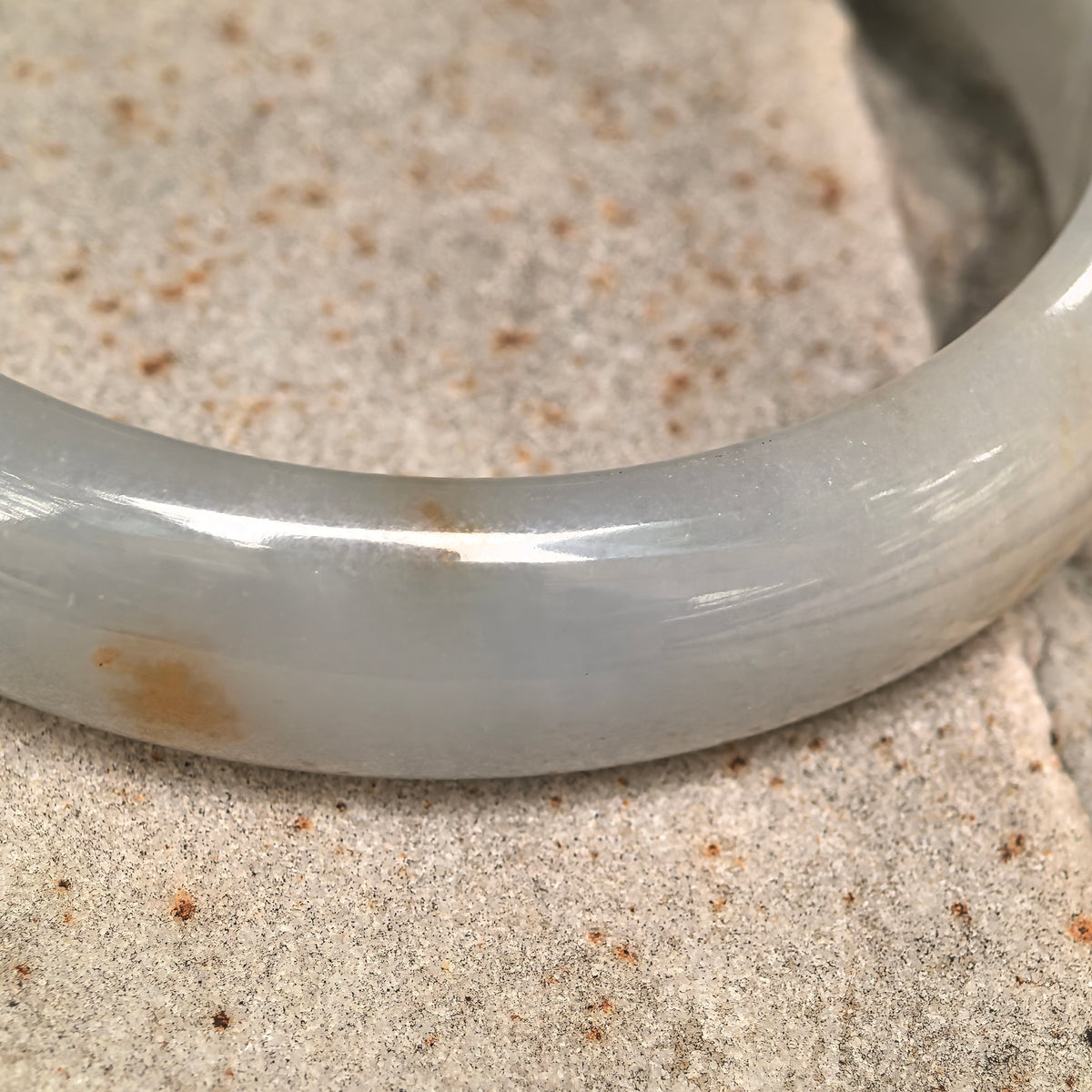 Fine Glutinous Pale White and Green D-Shape Jadeite Bangle with Golden Flecks -59mm