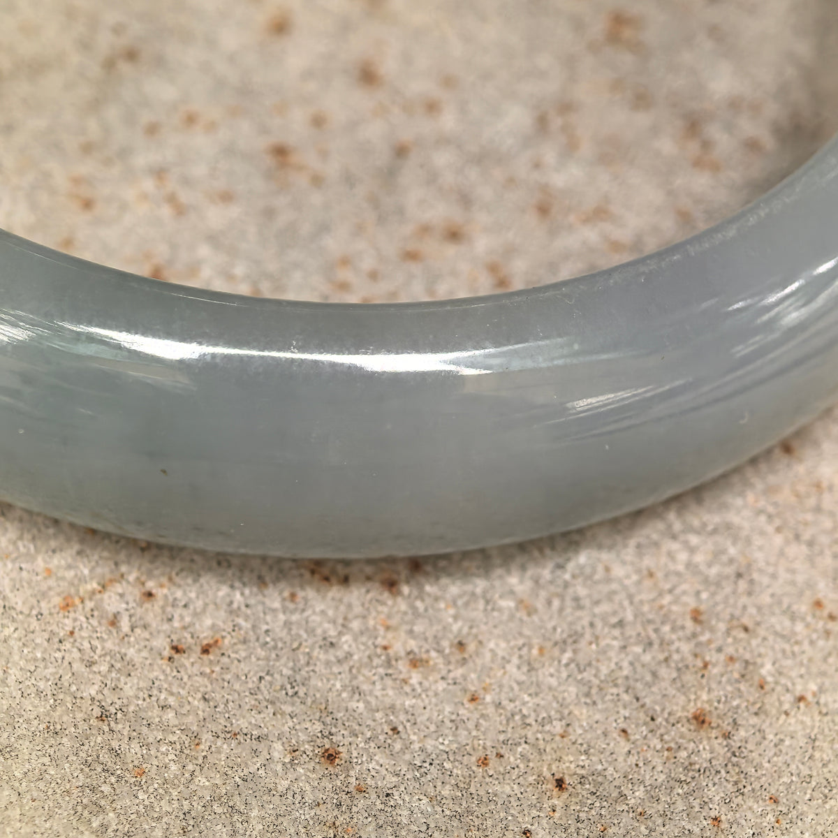 Fine Glutinous Pale White and Green D-Shape Jadeite Bangle with Golden Flecks -59mm