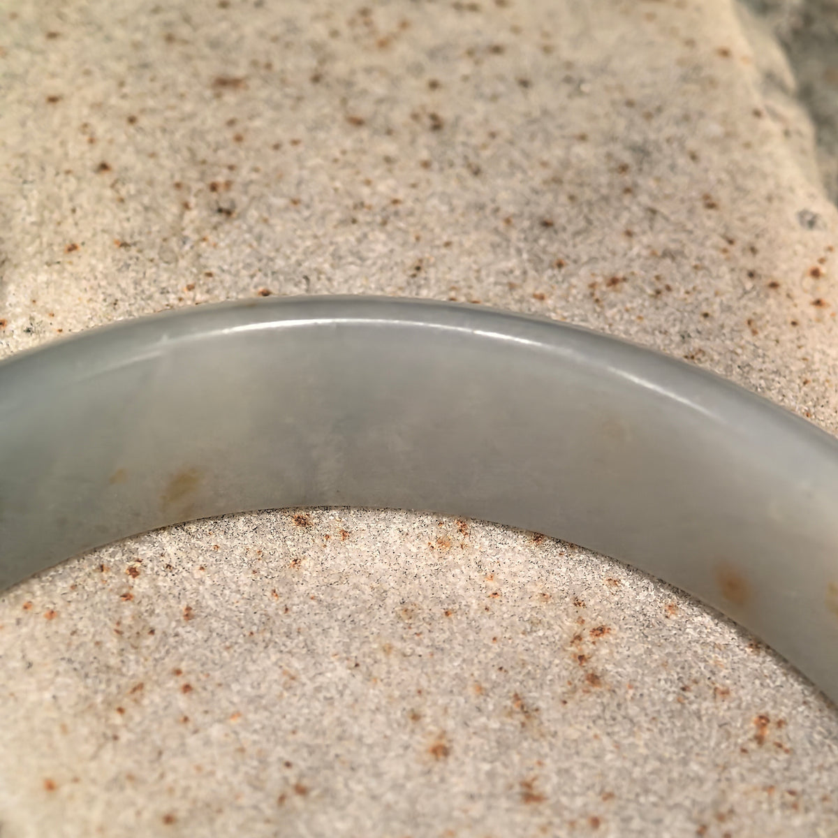 Fine Glutinous Pale White and Green D-Shape Jadeite Bangle with Golden Flecks -59mm
