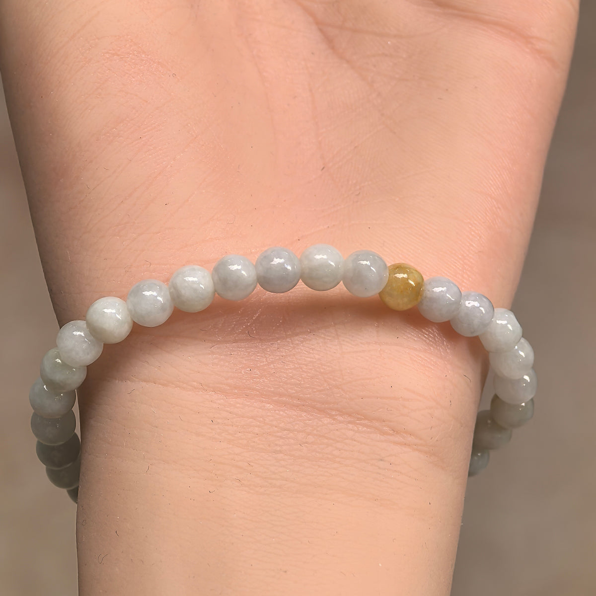 Glutinous Pale Green Jadeite Bead Bracelet with Yellow Accents · Not Sold Separately