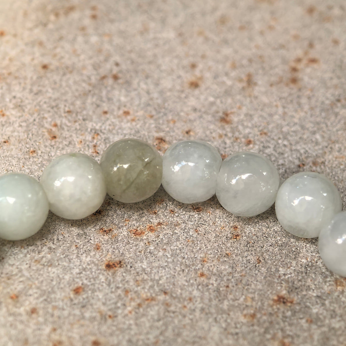 Glutinous Pale Green Jadeite Bead Bracelet with Yellow Accents · Not Sold Separately