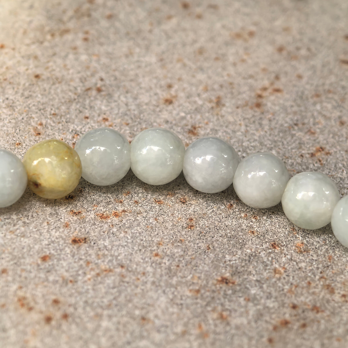 Glutinous Pale Green Jadeite Bead Bracelet with Yellow Accents · Not Sold Separately