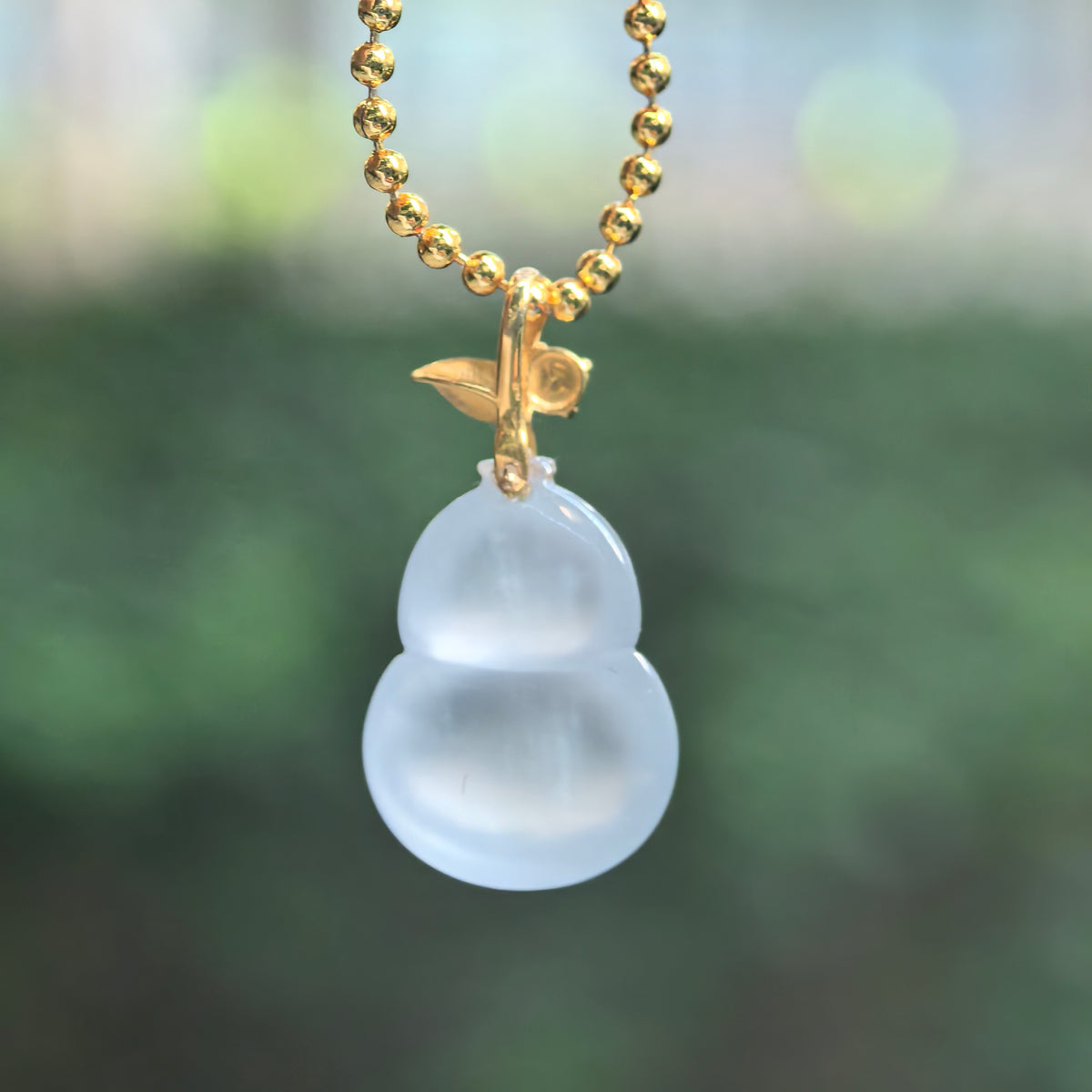 Icy Translucent White Jadeite Gourd Pendant in 18K Gold