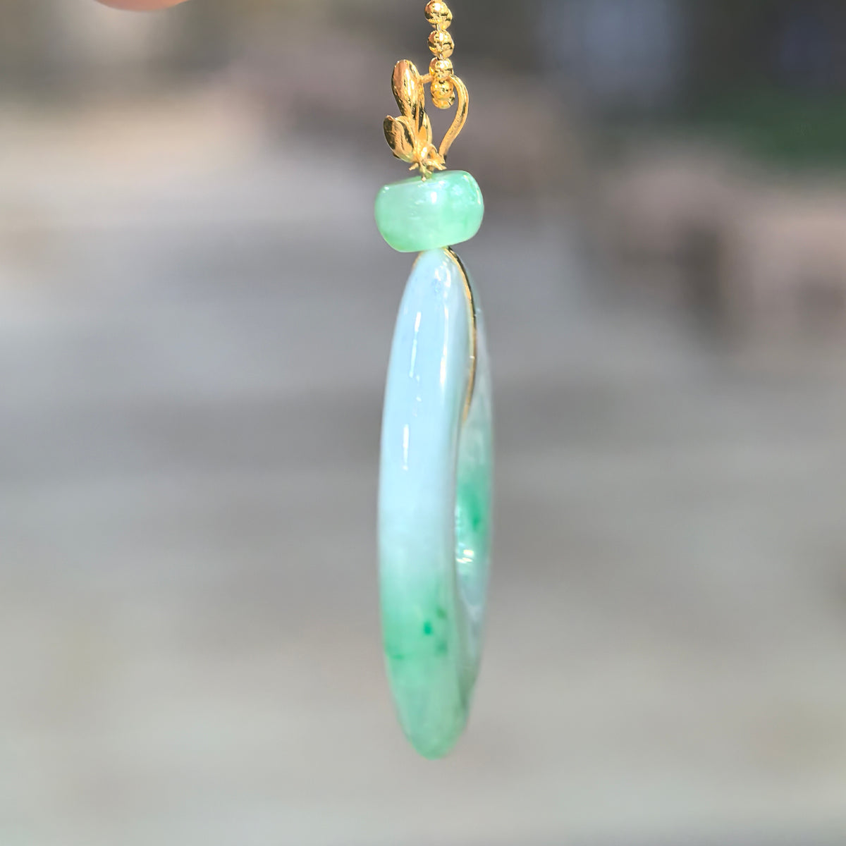 Icy Glutinous Light Green Jadeite Peace Pendant with Floating Green Patterns