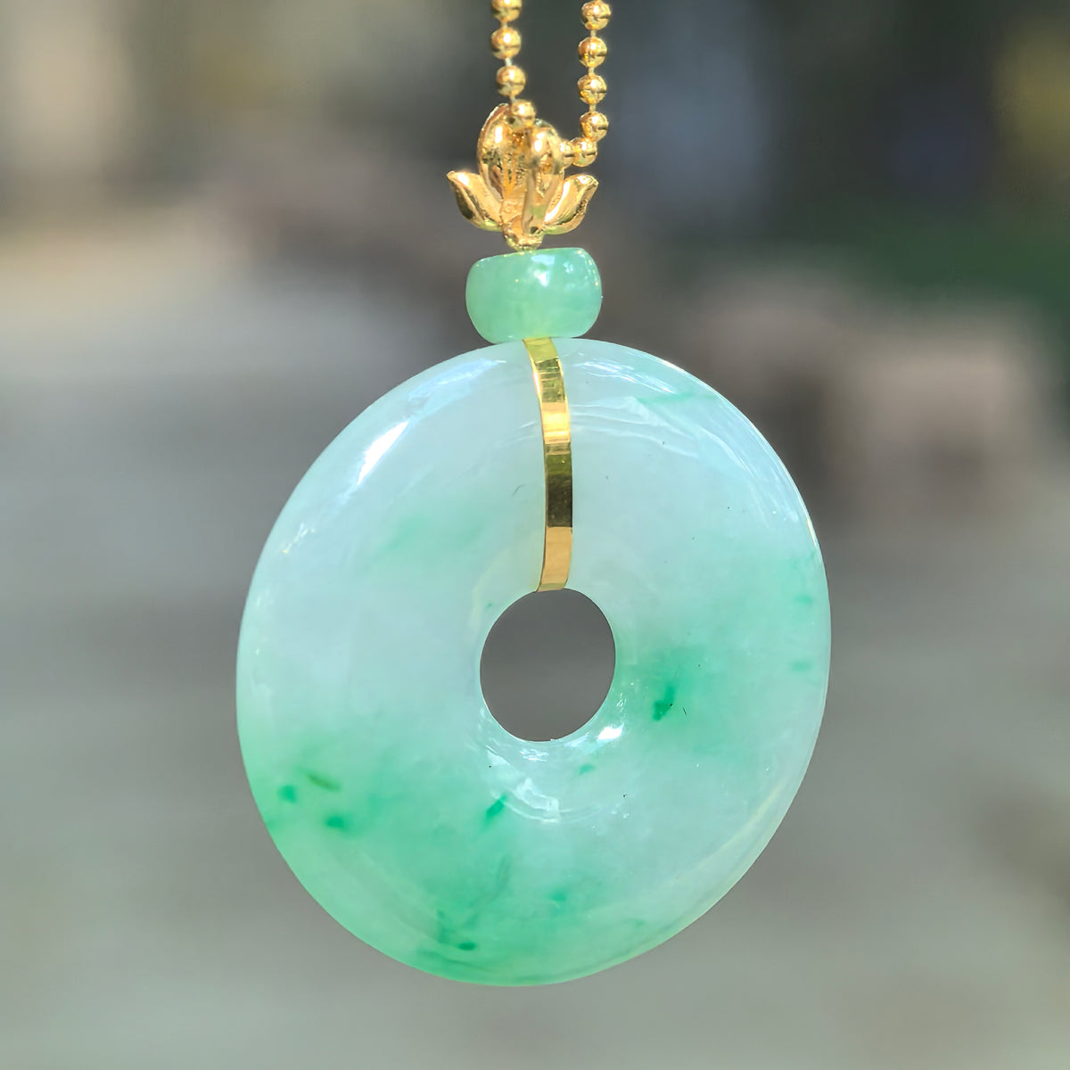 Icy Glutinous Light Green Jadeite Peace Pendant with Floating Green Patterns