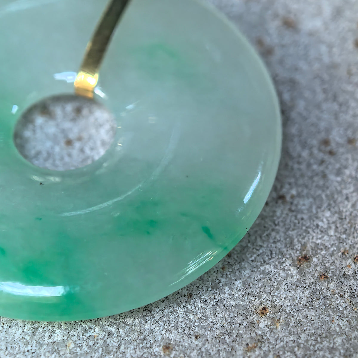Icy Glutinous Light Green Jadeite Peace Pendant with Floating Green Patterns