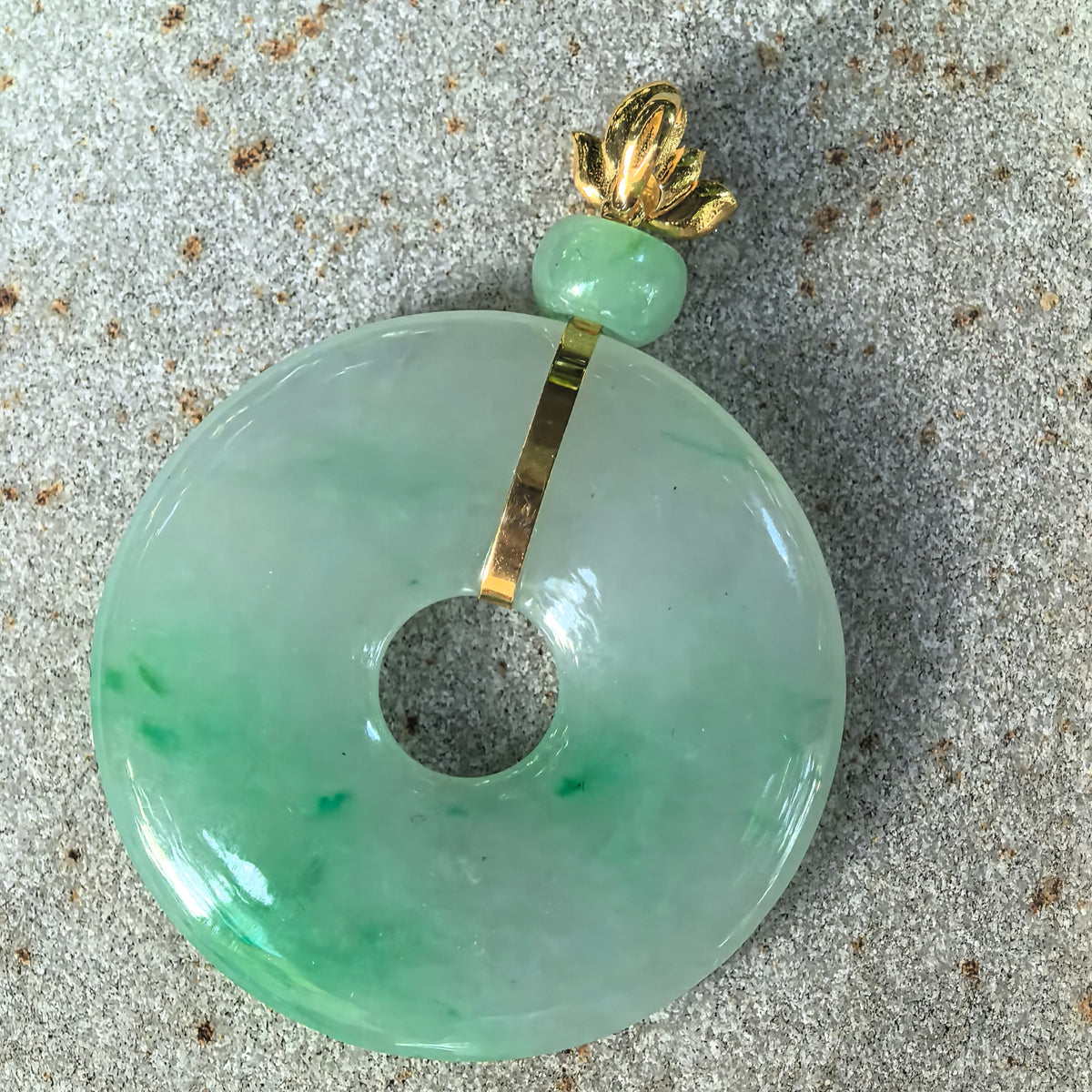 Icy Glutinous Light Green Jadeite Peace Pendant with Floating Green Patterns
