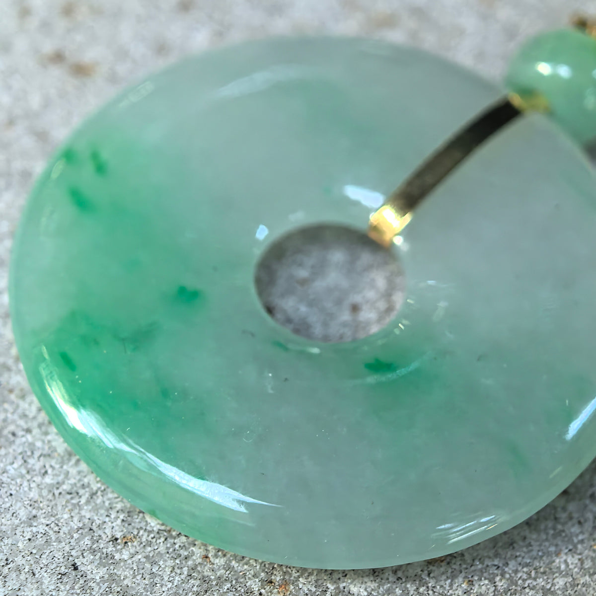 Icy Glutinous Light Green Jadeite Peace Pendant with Floating Green Patterns