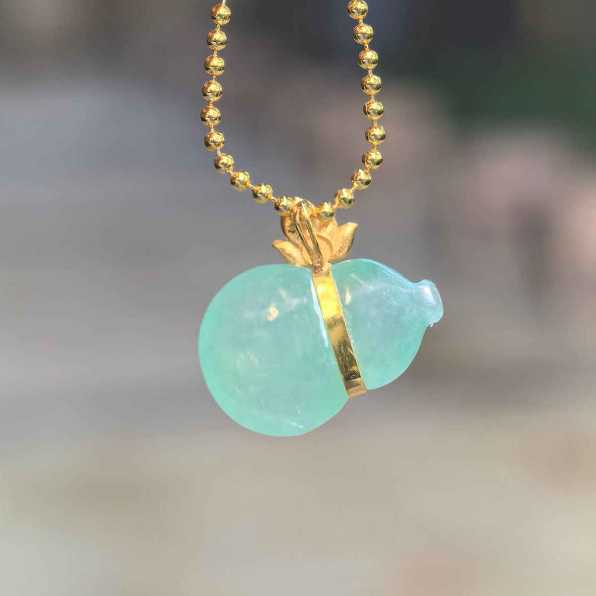 Icy Green Jadeite Horizontal Gourd Pendant in 18K Gold