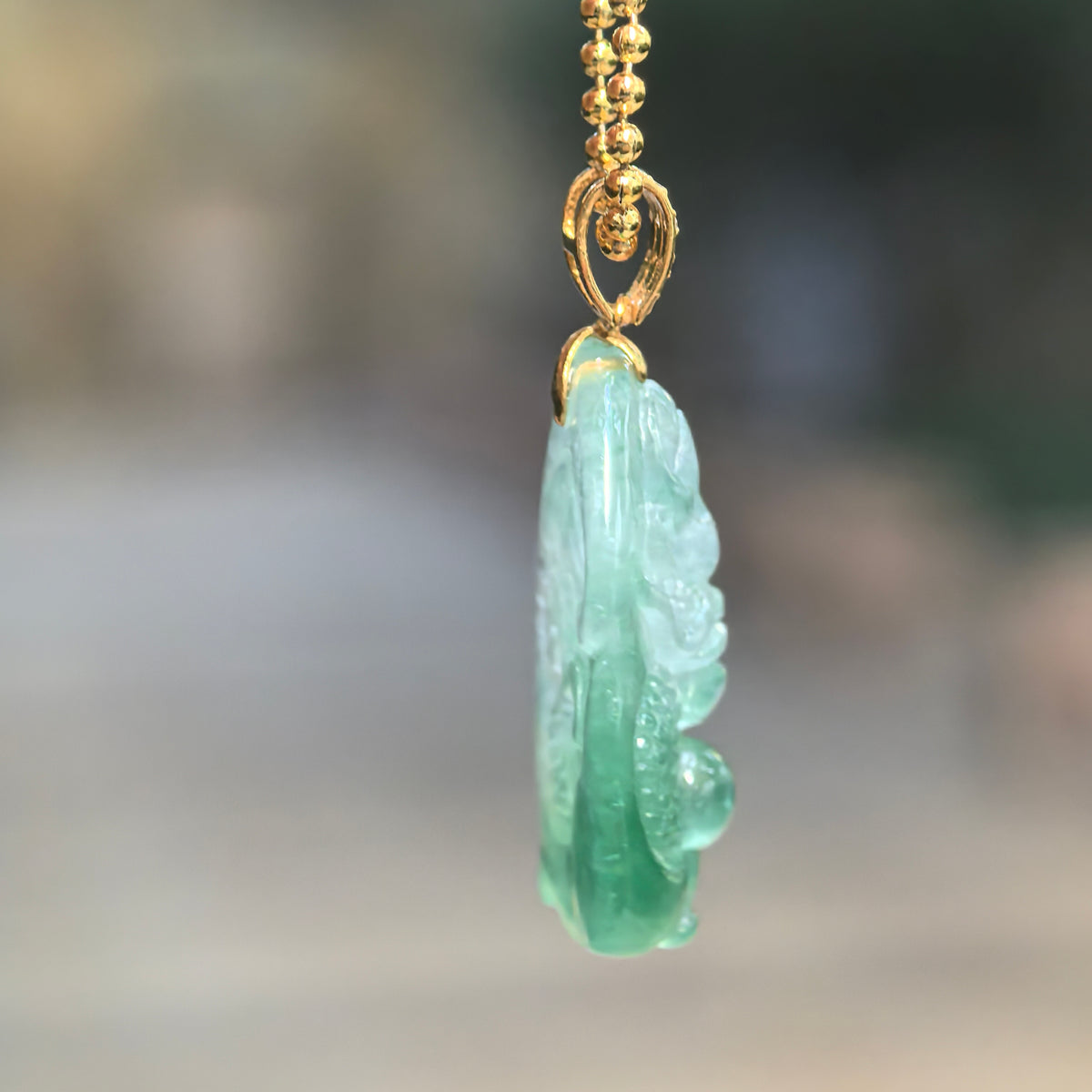 Icy Light Green Dragon Jadeite Pendant