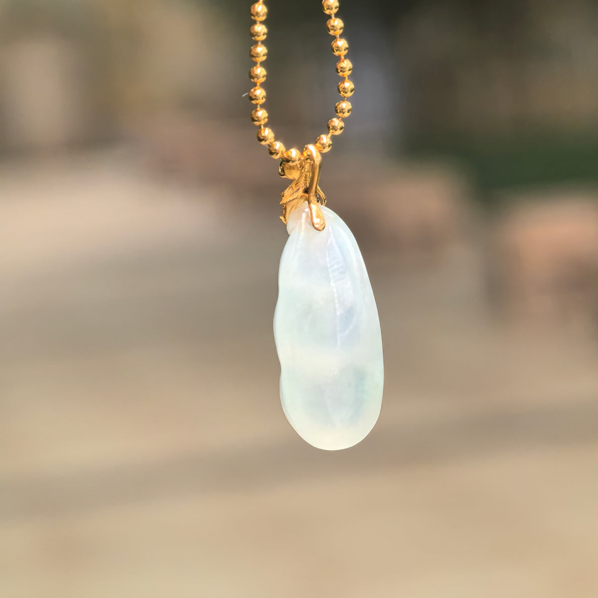 Icy Glutinous Pale Green Jadeite Bean Pod Pendant